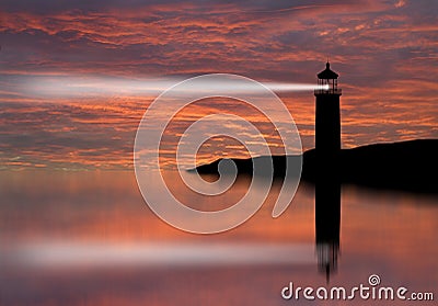 Lighthouse searchlight beam through marine air at night. Stock Photo