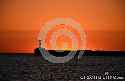 Lighthouse in Sunset Stock Photo