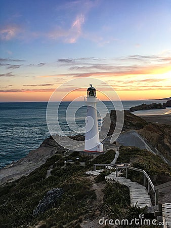 Lighthouse at sunset, New Zealand Stock Photo