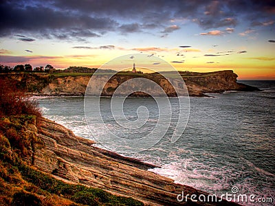 Lighthouse at sunset Stock Photo