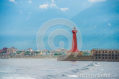 Lighthouse under sunburst Stock Photo