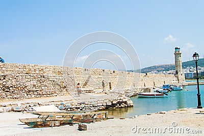 Lighthouse in the Venetian Harbor of Rethymno Editorial Stock Photo