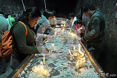 Lighting Candles For New Years Editorial Stock Photo