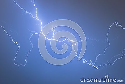 A lightning bolt creeps through the sky. Stock Photo