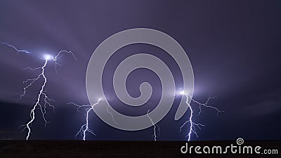 Lightning bolt strikes from a thunderstorm Stock Photo