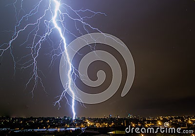 Lightning Bolt striking city skyline Editorial Stock Photo