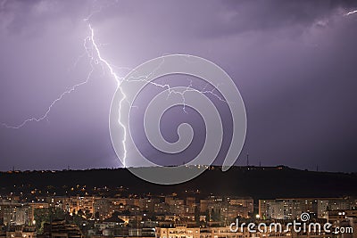 Lightning over city Stock Photo