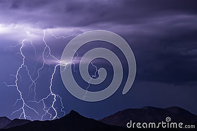 Lightning storm with double bolt strike at night Stock Photo