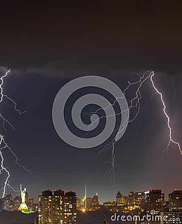 Lightning storm over the city at the summer heavy rain. Dramatic, breathtaking atmospheric natural phenomenon. Kyiv, Ukraine Editorial Stock Photo