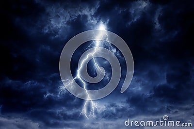 A lightning strike on a cloudy dramatic stormy sky. Stock Photo