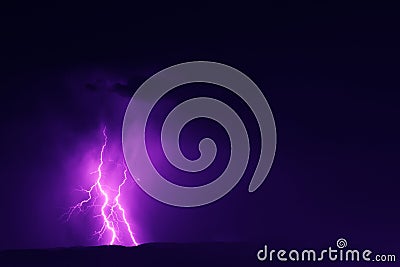 Lightning strike in the night sky Stock Photo