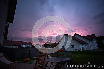 Lightning Strike Over Modern Housing Neighbourhood Stock Photo