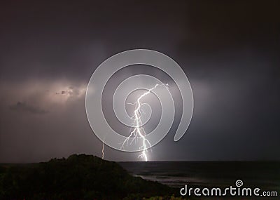 Lightning strike at sea Stock Photo