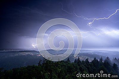 Lightning strike during a summer thunderstorm in the upper Rhine valley and the northern Black Forest Stock Photo