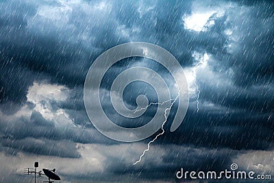 Lightning and thunderstorm flash with raining background. Bad weather and cloudy problem with aerial or satellite signal Stock Photo