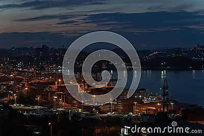 Lights at the commercial seaport of Vladivostok, the largest year-round port in the Russian Far East. Editorial Stock Photo