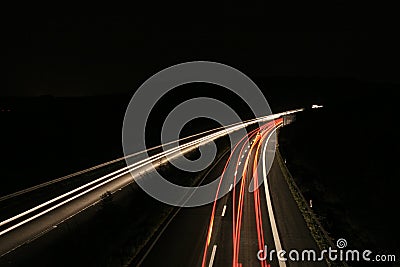 Lights of the freeway at night Stock Photo