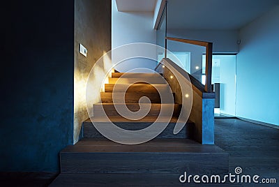 Lights illuminating the stairway in modern house interior Stock Photo