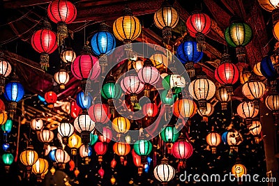 lights and lanterns on the ceiling of a hall Stock Photo