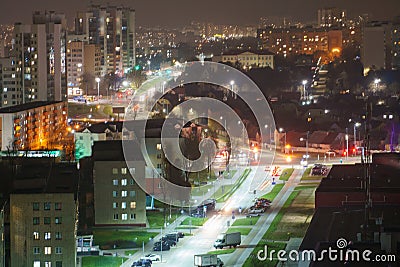 The lights of the night city. View of the busy city traffic and the light from the headlights of cars at night. The lights are on Editorial Stock Photo