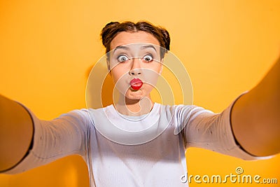 Like child. Portrait of cute funny joking funky lovely girlish lady fooling around making photos videos sharing on Stock Photo