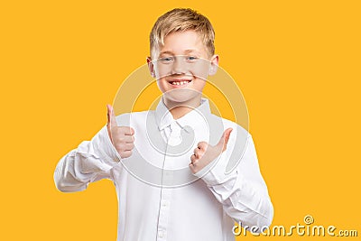 Like gesture approval sign cheerful boy thumbs up Stock Photo