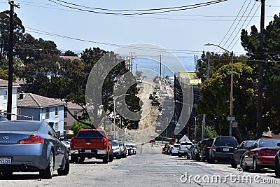 Much needed new housing for San Francisco, with a sail boat leisurely going by in the background. Editorial Stock Photo