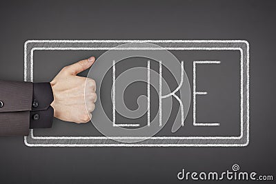 Like text on blackboard with businessman hand Stock Photo