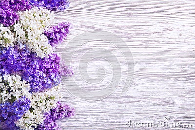 Lilac Flowers Bouquet on Wooden Plank Background, Purple Wood Stock Photo