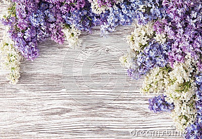 Lilac Flowers Bouquet on Wooden Plank Background, Spring Stock Photo