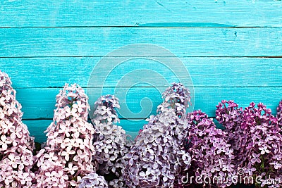 Lilac Flowers Bouquet on Wooden Plank Background Stock Photo