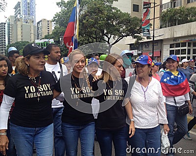 Lilian Tintori wife of Leopoldo Lopez and Venezuela deputy Freddy Guevara Protests in Venezuela Editorial Stock Photo