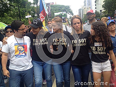 Lilian Tintori wife of Leopoldo Lopez and Venezuela deputy Freddy Guevara Protests in Venezuela Editorial Stock Photo