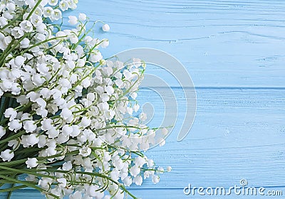 Lily of the valley beautiful on blue wooden celebration decorative floral spring flowers greetings Stock Photo