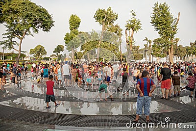 LIMA, PERU - JANUARY 22, 2012: People enjoying hot summer day Editorial Stock Photo