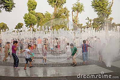 LIMA, PERU - JANUARY 22, 2012: People enjoying hot summer day Editorial Stock Photo