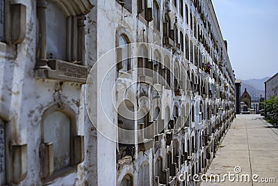 Presbitero maestro ancient cemetery in Lima. Wall of graves. Stock Photo