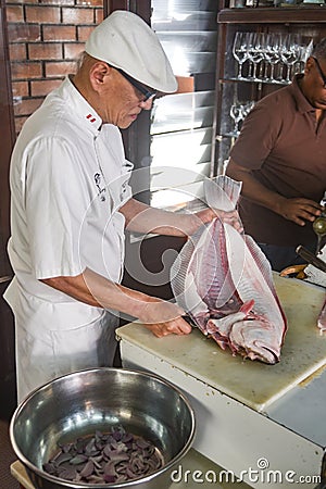 Peruvian Chef Javier Wong, prepares fresh ceviche and seafood dishes at his restaurant Chez Wong. Lima, Peru Editorial Stock Photo