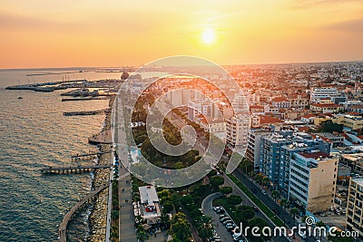 Limassol, Cyprus aerial view at sunset. Promenade with alley and buildings. Drone photo of mediterranean sea resort from Stock Photo