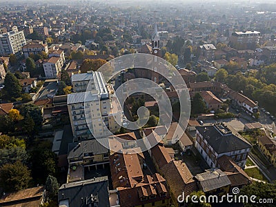 Limbiate, aerial view, the parish of St. George, the church, homes and streets downtown streets. Italy Stock Photo