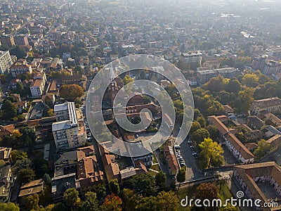 Limbiate, aerial view, the parish of St. George, the church, homes and streets downtown streets. Italy Stock Photo