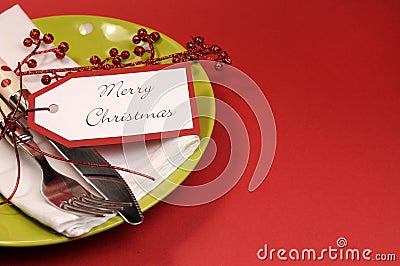 Lime green and red Merry Christmas table place setting, with copy space for your text here. Stock Photo