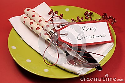 Lime green and red Merry Christmas table place setting. Stock Photo