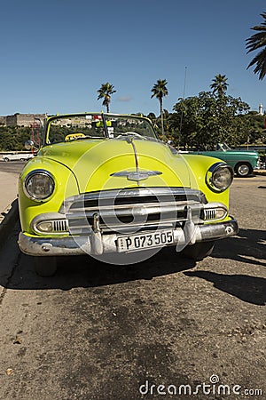 Lime green vintage Chevrolet convertible taxi Havana Editorial Stock Photo