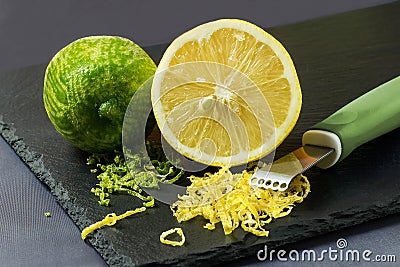 Lime and lemon, citrus zest and knife to peel Stock Photo
