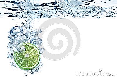 Lime slice in water Stock Photo