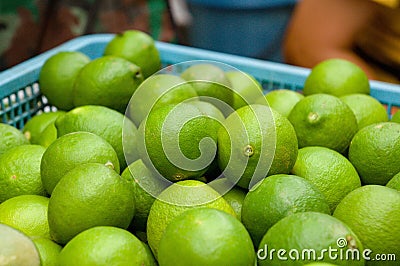 Limes in a thai market Stock Photo