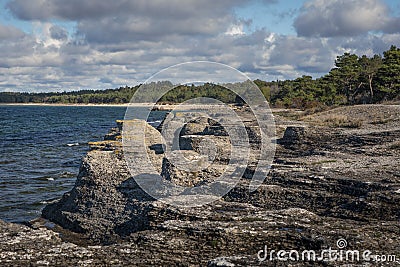 Limestone cliffs at coast of the island Oland in Sweden Stock Photo