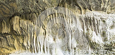 Limestone at the entrance of a cave Stock Photo