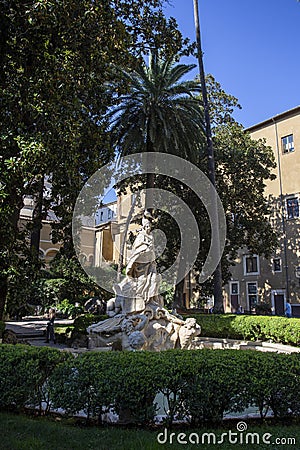 Limestone fountain in a courtyard in Rome Stock Photo